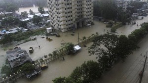 A street is seen submerged by flood water in Chittagong