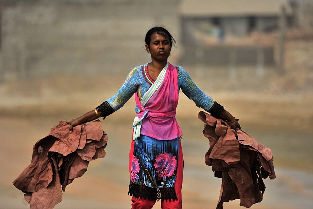 Women And Children Work At The Hazaribagh Toxic Leather Tannery In Dhaka, Bangladesh