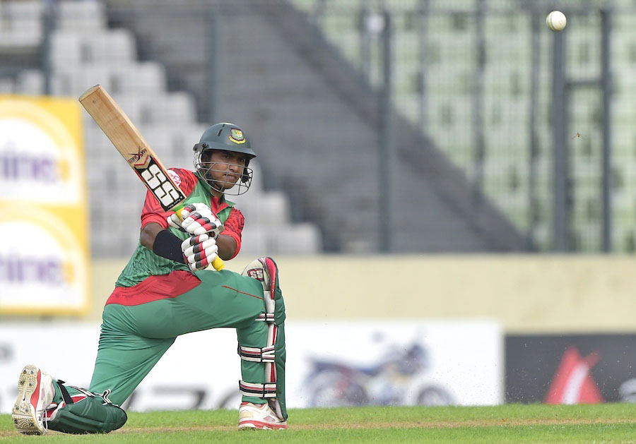 Bangladesh cricketer Soumya Sarkar plays a shot during the first one day international (ODI) cricket match between Bangladesh and India at The Sher-e-Bangla National Cricket Stadium in Dhaka on June 18, 2015. AFP PHOTO/Munir uz ZAMAN        (Photo credit should read MUNIR UZ ZAMAN/AFP/Getty Images)