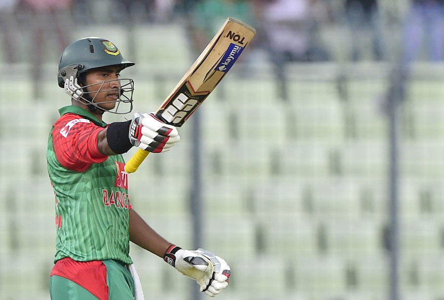 Bangladesh cricketer Soumya Sarkar reacts after scoring a half century (50 runs) during the first one day international (ODI) cricket match between Bangladesh and India at The Sher-e-Bangla National Cricket Stadium in Dhaka on June 18, 2015. AFP PHOTO/Munir uz ZAMAN        (Photo credit should read MUNIR UZ ZAMAN/AFP/Getty Images)