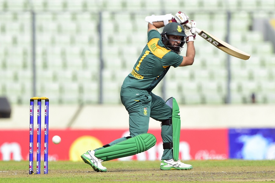 South Africa captain Hashim Amla plays a shot during the second ODI (One Day International) cricket match between Bangladesh and South Africa at the Sher-e-Bangla National Cricket Stadium in Dhaka on July 12, 2015. AFP PHOTO/ Munir uz ZAMAN        (Photo credit should read MUNIR UZ ZAMAN/AFP/Getty Images)